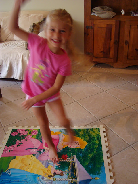Young girl dancing on Princess interlocking foam sheets
