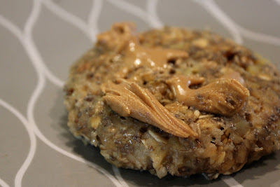 Microwave Banana Oat Cakes with peanut butter on plate