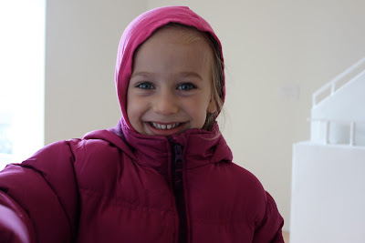 Close up of girl in jacket with a hood pulled up