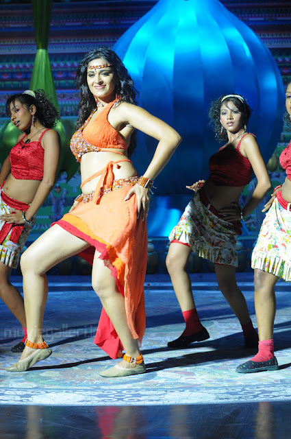 Anushkha showing her milky white thighs in short skirts