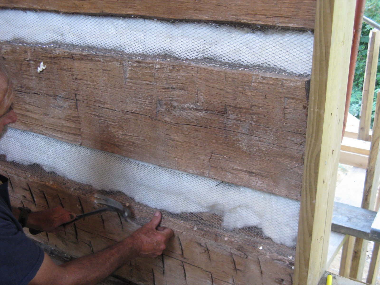 Old Log Cabin Revival Inside Chinking and Framing in the Gable