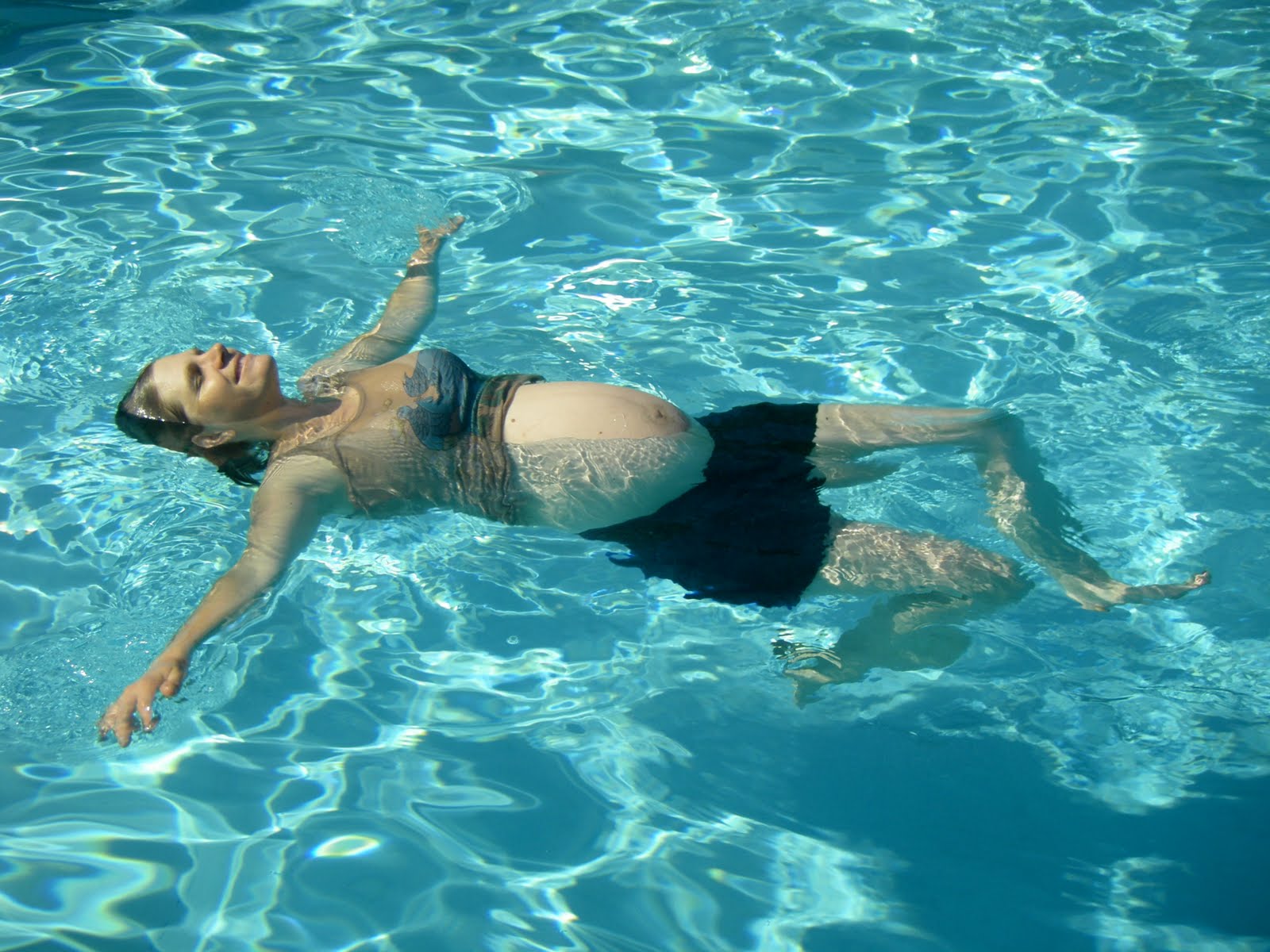 Pregnant Woman Swimming 56