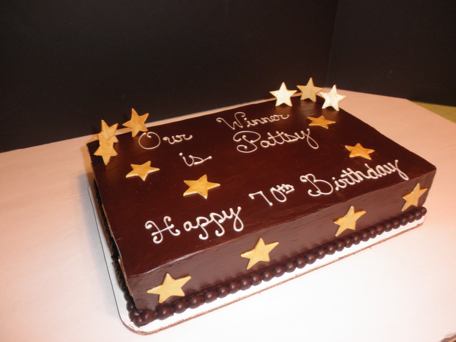 Sweet T's Cake Design: 70th Birthday Winner sheet cake and ...