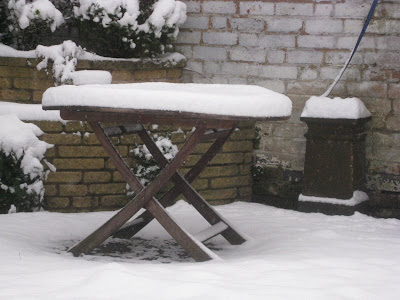 Garden table with 4 inches of snow