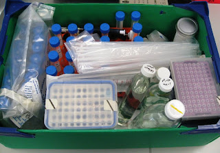 Lab box full of tubes and bottles