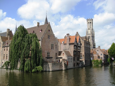 View of canal, houses and the Belfort