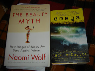 The covers of Naomi Wolf's The Beauty Myth and Jack McDevitt's Omega
