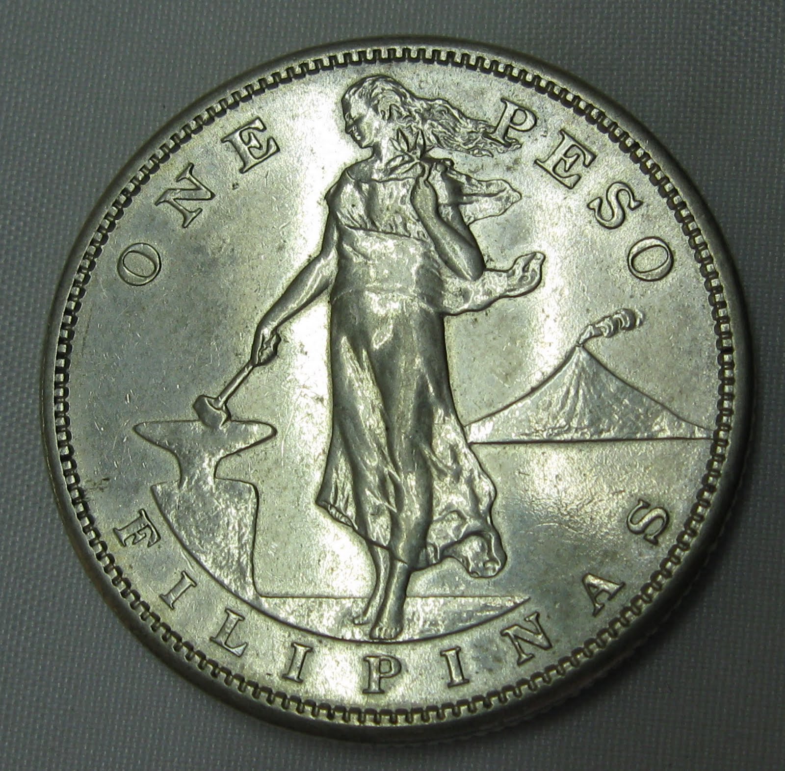 Bruno & Hancock My 1910 S US Philipines One Peso AU Coin