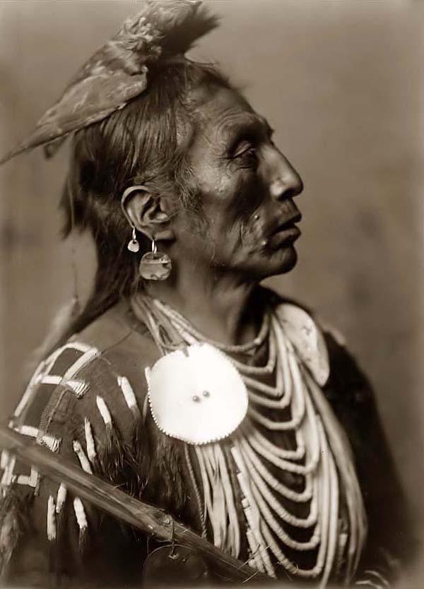 Poems From Planet Earth: Navajo woman. Crow tomahawk. Crow medicine man.