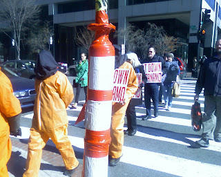 Gitmo protestors crossing K Street