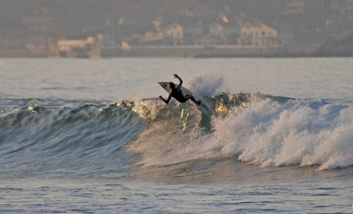 Juan surfing