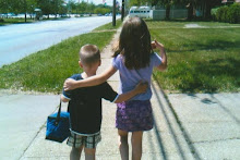 Isn't this precious...Cousins...two of my grandchildren.