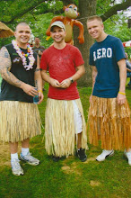 3 of my 4 sons in their grass skirts...
