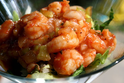 A spicy marinade of chili sauce, hot sauce, citrus vodka, horseradish, celery, garlic, sweet onion, and Cajun seasoning, tossed with shrimp for a fantastic appetizer.