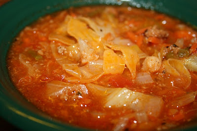 This cabbage soup is often referred to as zero point or free soup, because it is low calorie and primarily tomato and vegetable centered. Filling, satisfying and tasty too!