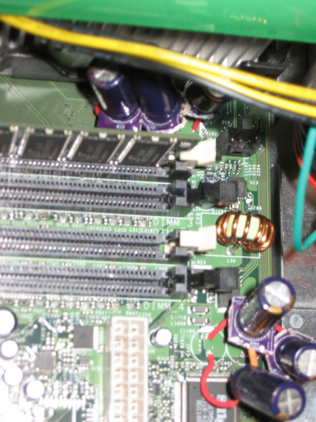 Underling Labs Replacing Capacitors in a Motherboard.