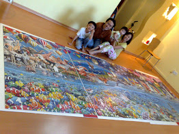 Solskjaer, Seraphina, Joyce & Andrew with completed World's Largest Puzzle