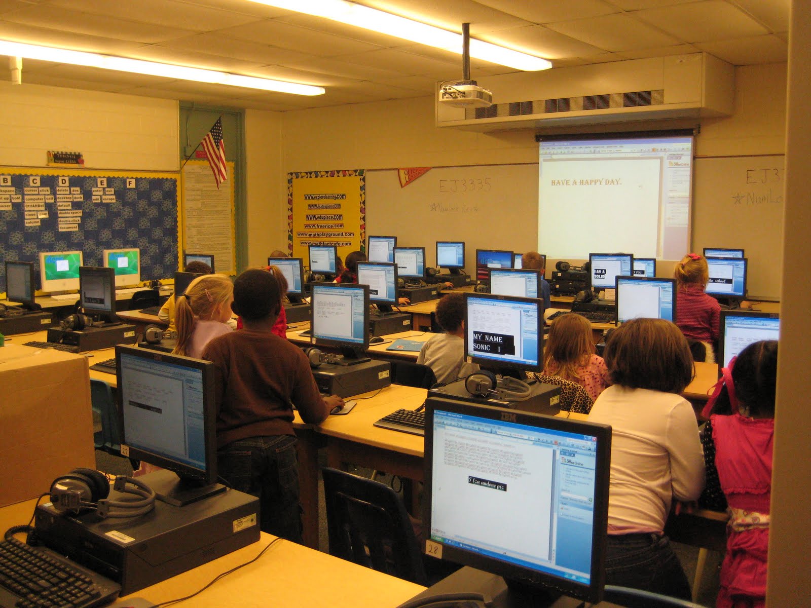 First Grade with Mrs. Ledford and Mrs. Vaillette In the Computer Lab Today