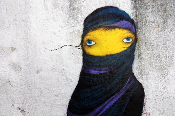 Italian street art in Puglia by artists Os Gemeos painted for Fame Festival