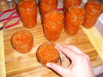 Making Marmalade - wiping the rims Making Marmalade - wiping the rims