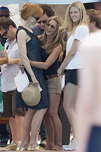 Jennifer gives Nicole a warm hug as the leading ladies share a giggle together on set, joined by their blonde co-star Brooklyn 