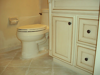 diagonal ceramic tile with new vanity and Kohler toilet 