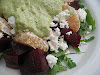 Roasted Beet Salad with Pistachio Pesto and Goat Cheese Served over Fresh Arugula
