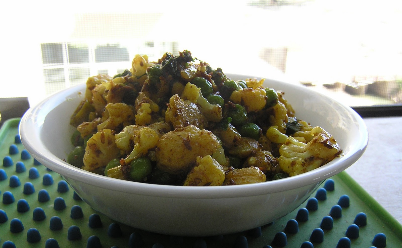 The Melting Pot Cauliflower & Peas with Roasted Cumin