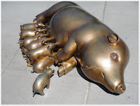 golden pig with eleven piglets