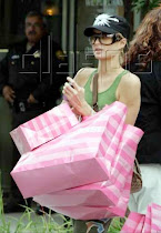 Paris Hilton, looks at those bags