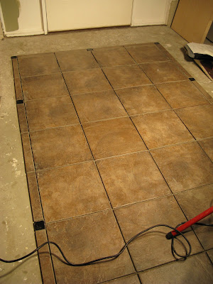 Our Extreme Home Makeover experience: Entryway tile progresses!