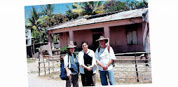 Rae, Damien and PhD student, Sue Downie, in front of the 'Chinese House', Balibo, 30 August 1999