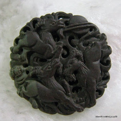 Round stone pendant Intricate designed, hand-carved and "Sheep" pendant