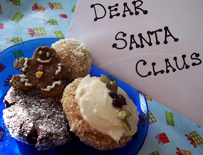 Plate full of cookies with sign that read Dear Santa Claus