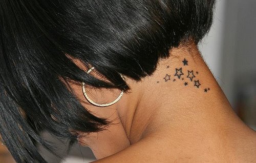 star tattoo on her back extended before heading off to a surprise