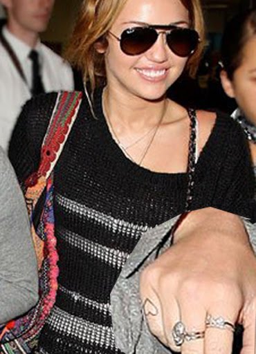Miley Cyrus finger tattoo design Tag celebrity tattoosfemale celebrity 