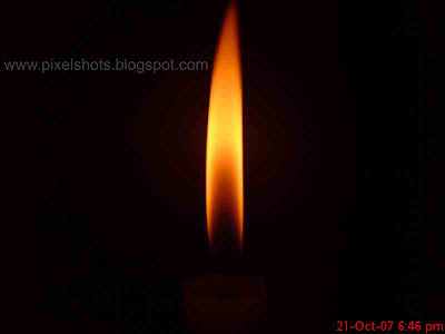 long candle flame macro mode digital photograph