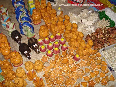 beach side toys for sale photographed in flash during night using cybershot digital camera