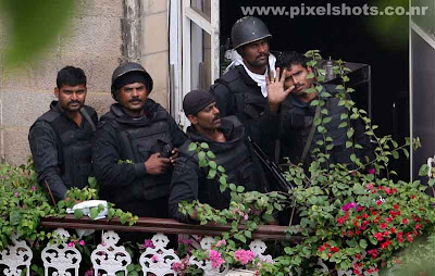 commandos in the taj palace hotel balcony just after the anti terrorist operation on terrorist attack on mumbai