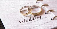 planner and wedding rings