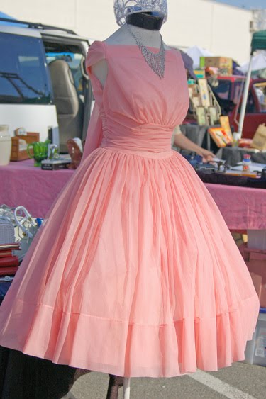 I would wear it with pearls, probably pink ones.