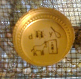 Mickey's Beer Cap Puzzle Answer Board: Mickeys Beer Cap Puzzle 14: D