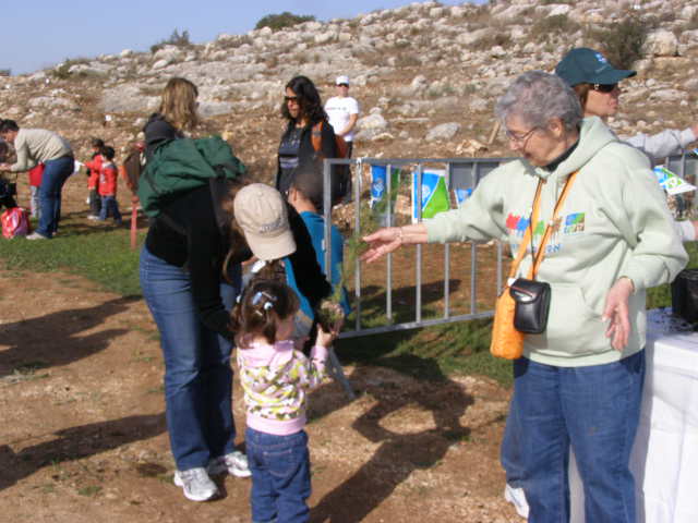 [Handing+out+trees1290060+(61).JPG]