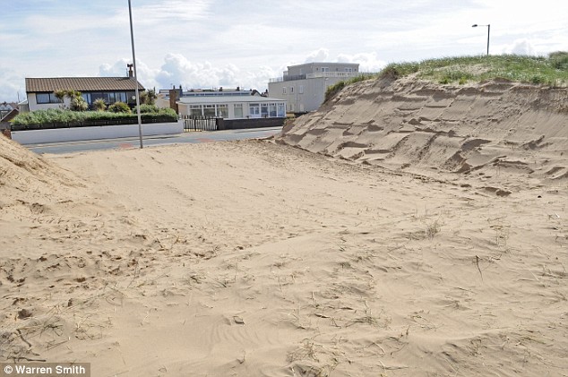 [homeowner+bulldozes+sand+dunes.jpg]