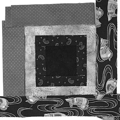 God's Eye quilt by Robin Atkins, auditioning fabrics, grayscale to evaluate value