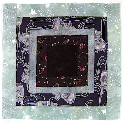 God's Eye quilt by Robin Atkins, auditioning fabrics, finished block