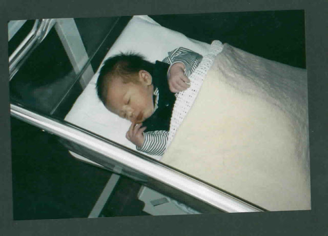 baby in hospital crib