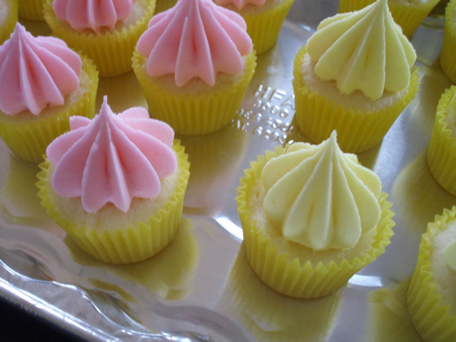 the baby shower was pink and yellow, so I baked half in yellow cupcake ...