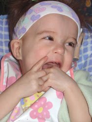 [2006.02.21EdenHandsSmile.jpg]