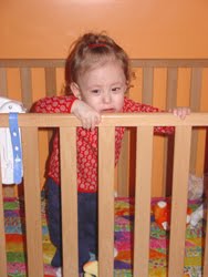 [2006.02.06HollandStandinginCrib.jpg]